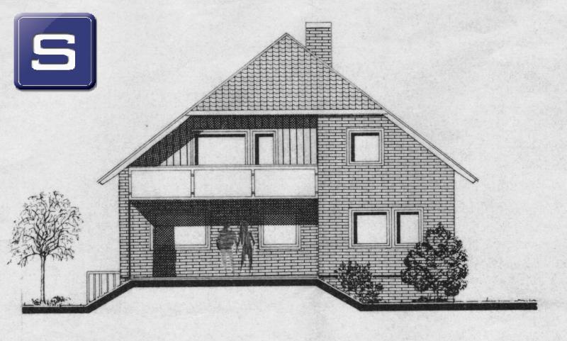 Klassischer nordischer Klinkerbau mit Krüppelwalmdach